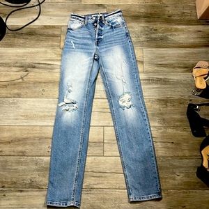 The dad Jean fit. Ripped. Four buttons. Size 22.